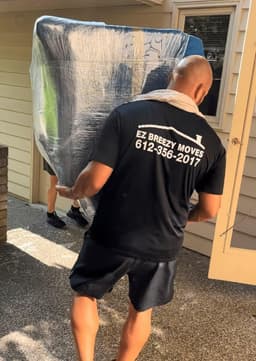 EZ Breezy Movers logo